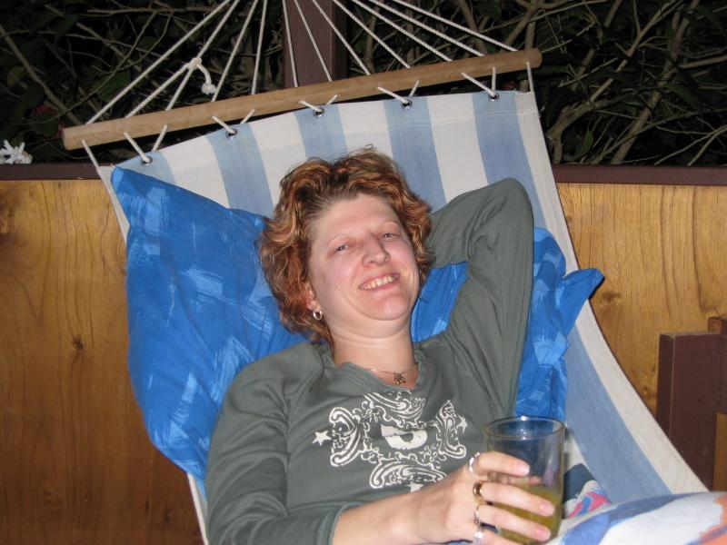 Cherie enjoying the hammock on our deck
Click for photo quality image
Warning photo quality image size is 568K